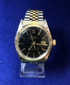 Rolex Datejust con brazalete jubilee duotono, Ref.: 1601, con esfera negra de 38mm, automático, año 1977, en acero y oro.