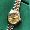 Rolex Lady Datejust con brazalete jubilee, Ref.: 69173, esfera color champagne de 28mm, automático, en acero y oro amarillo de ley 18 kts. Año 1985, con caja y documentación.