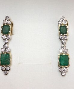 Pendientes vintage (años 80) de dos cuerpos con 7 cts de esmeraldas en total y 1'20 cts de brillantes realizados en oro amarillo de ley 18 kts.