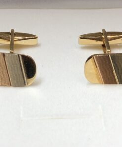 Gemelos realizados en oro tricolor de ley 18 kts.