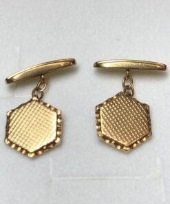 Gemelos hexagonales realizados en oro amarillo de ley 18 kts.