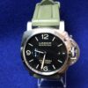 Reloj Panerai Luminor Marina, automático, de acero y pulsera de caucho color verde militar.