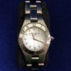 Reloj de señora Baume & Mercier, modelo Date Linea (M0A10011), con esfera de 27mm de madreperla y horas con brillantes, realizado en acero, mecanismo de cuarzo, año 2024.