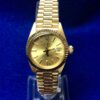Rolex Lady Datejust, brazalete jubilee con esfera color champán de 28 mm, Ref.: 6917, realizado en oro amarillo de ley a8 kts., automático, año 1982