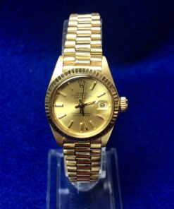Rolex Lady Datejust, brazalete jubilee con esfera color champán de 28 mm, Ref.: 6917, realizado en oro amarillo de ley a8 kts., automático, año 1982