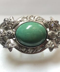 Sortija vintage con turquesa verde y 0'25 cts de brillantes, realizada en oro blanco de ley 18 kts.